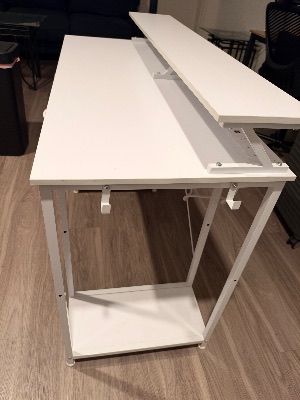 White 47in desk with drawers and power strip 2