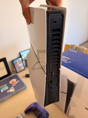 Like-New PS5 Slim Disc Edition (1TB) + 2 Controllers (White & Purple) + Astro Bot & Battlefield 6 — Complete in Box 3