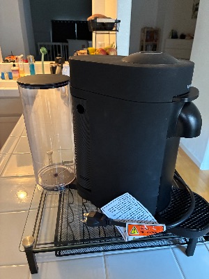 Nespresso VertuoPlus (De'Longhi, matte black) + glass capsule drawer stand + refill kit — $100 2