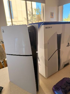 Like-New PS5 Slim Disc Edition (1TB) + 2 Controllers (White & Purple) + Astro Bot & Battlefield 6 — Complete in Box 2