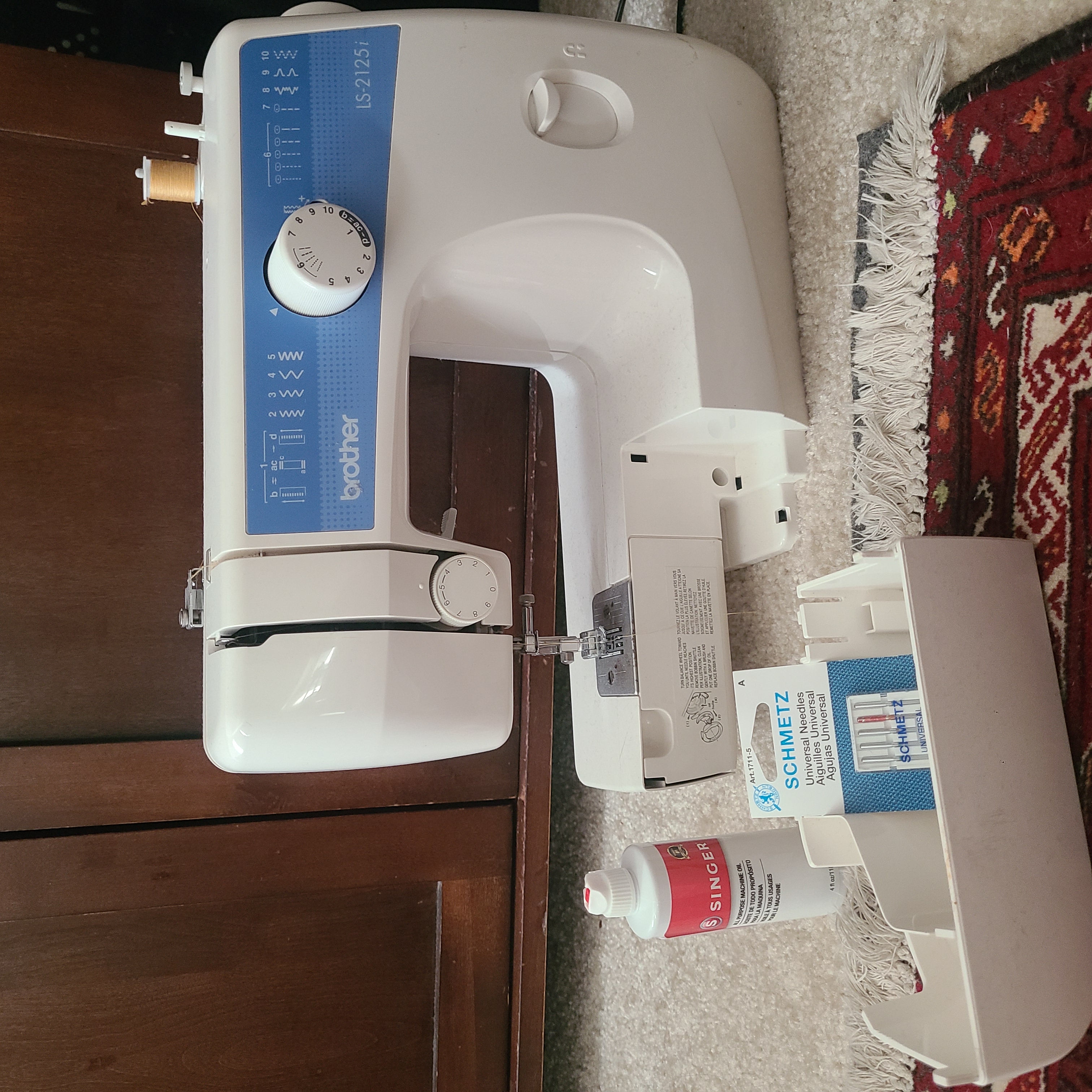 Brother sewing machine + unused accessories 1