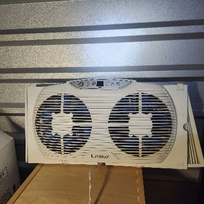 Lasko BlueTooth controlled, dual direction window fan 1