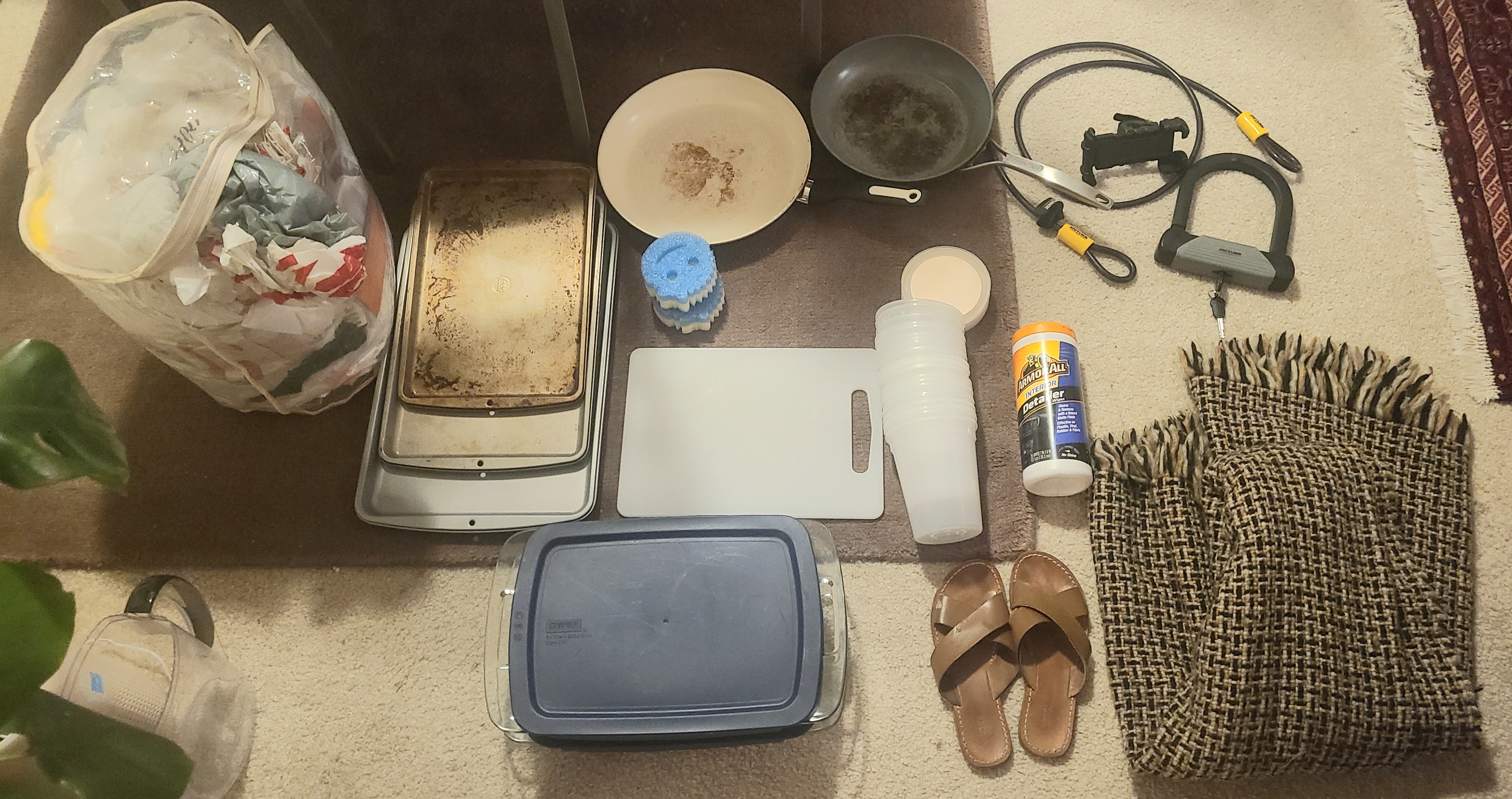 Kitchen items, bike/car accessories, blanket, and women's sandals. 1